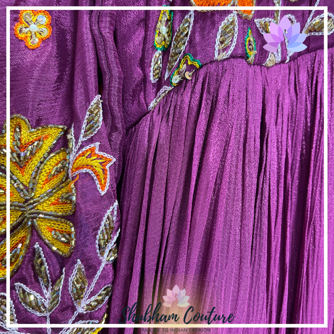 Beautiful chinon silk long dress with designer maggam work on sleeves and yoke