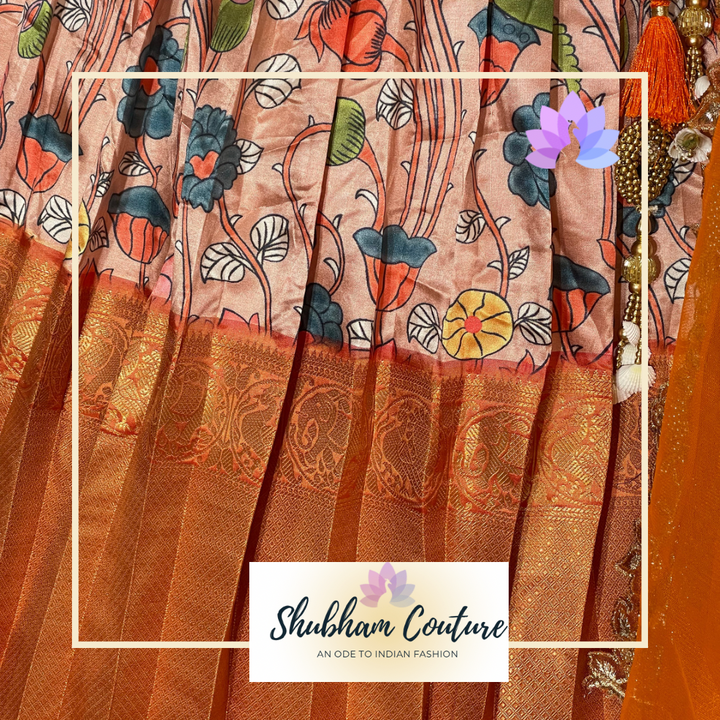 Kalamkari lehanga with orange blouse and net dupatta