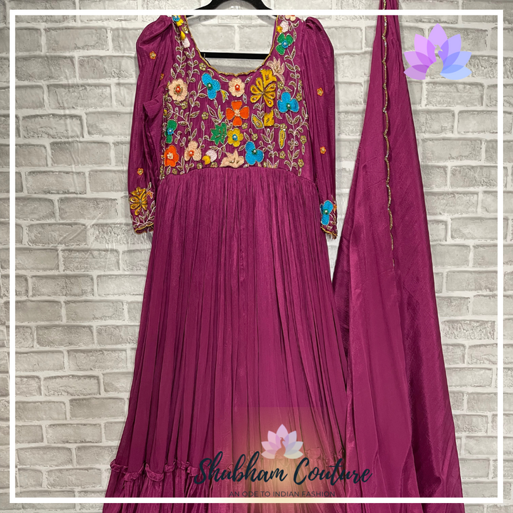 Beautiful chinon silk long dress with designer maggam work on sleeves and yoke