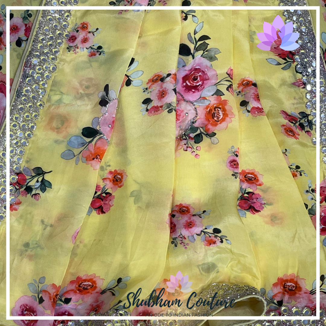 Stunning yellow mirror border printed pure crape saree