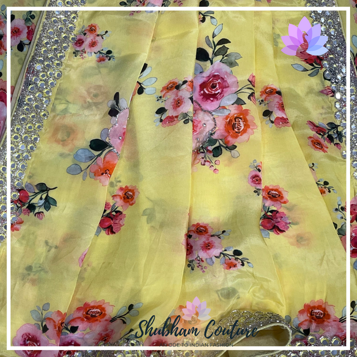 Stunning yellow mirror border printed pure crape saree