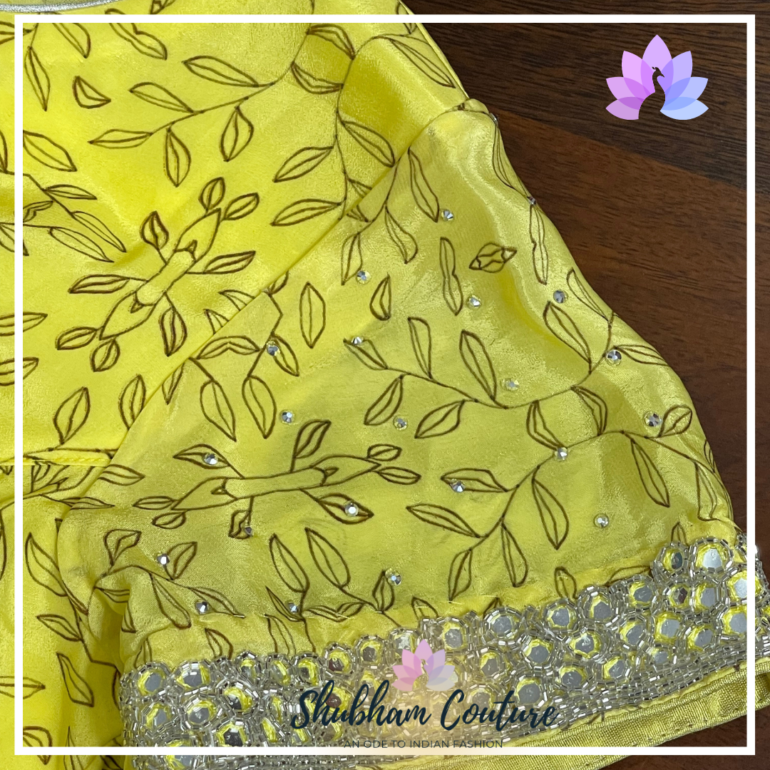 Stunning yellow mirror border printed pure crape saree