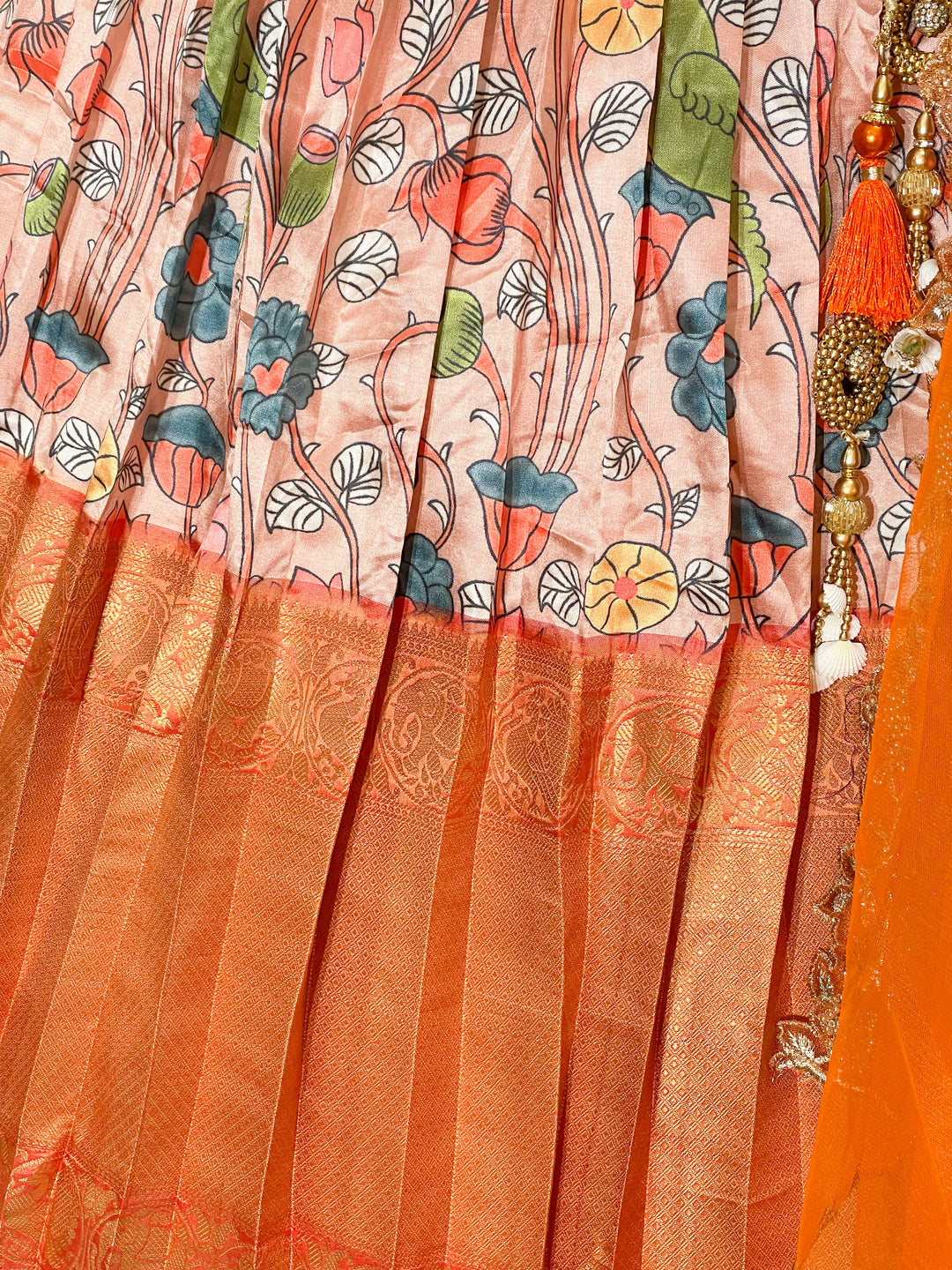 Kalamkari lehanga with orange blouse and net dupatta