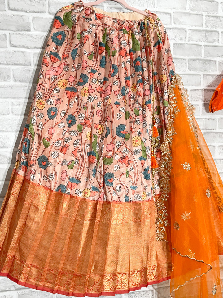 Kalamkari lehanga with orange blouse and net dupatta