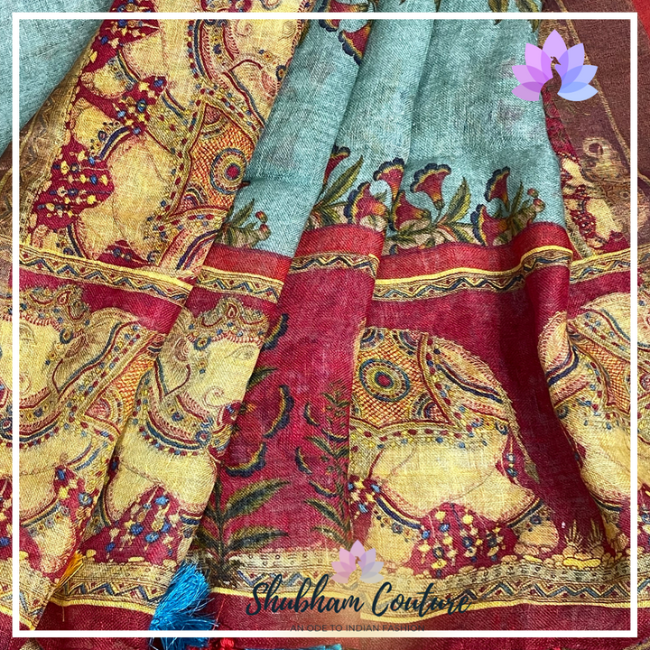 Premium Linen in pastal green and red border with rich prints all over