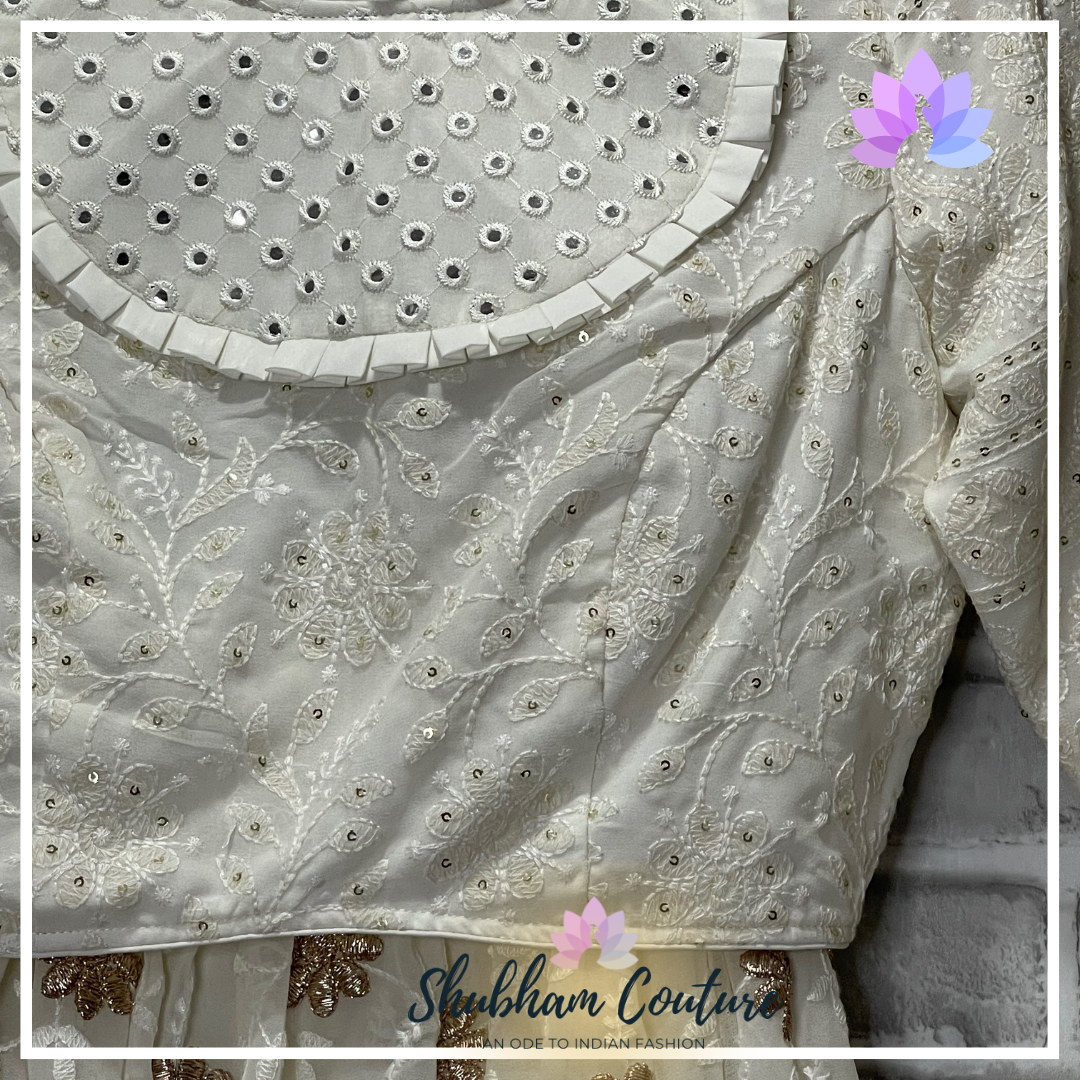 Elegant white threadwork and designer blouse lehanga