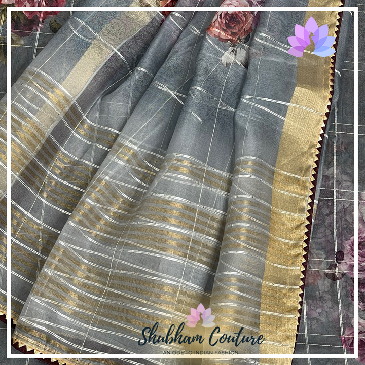 Floral grey organza saree with contrast kalamkari blouse in wine